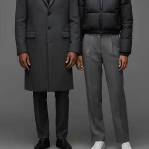 Detail of our AI image: Grey suit trousers